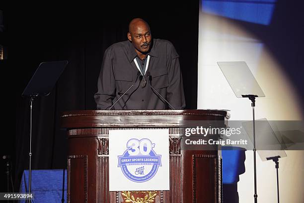 Former NBA player Karl Malone speaks onstage during the 30th Annual Great Sports Legends Dinner to benefit The Buoniconti Fund to Cure Paralysis at...