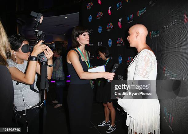 Catherine Britt speaks to the medai at the 29th Annual ARIA Nominations Event on October 7, 2015 in Sydney, Australia.