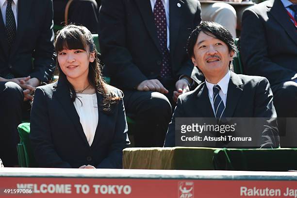 Prince Fumihito of Akishino and his first daughter Princess Mako of Akihisno watch the men's singles first round match between Joao Sousa of Portugal...