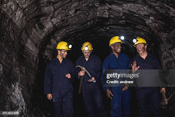 group of miners at a mine - miner pick stock pictures, royalty-free photos & images