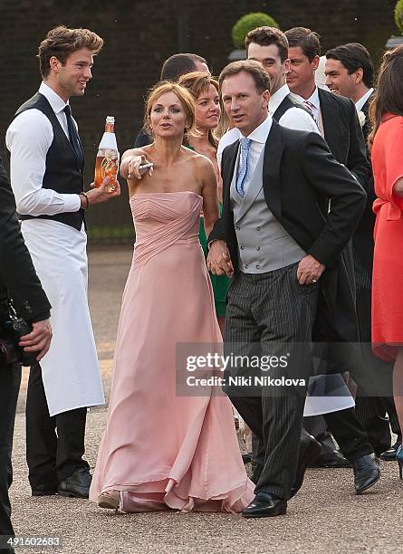 Geri Halliwell and Christian Horner attend Poppy Delevingne and James Cook's wedding reception held in Kensington Palace Gardens on May 16, 2014 in...