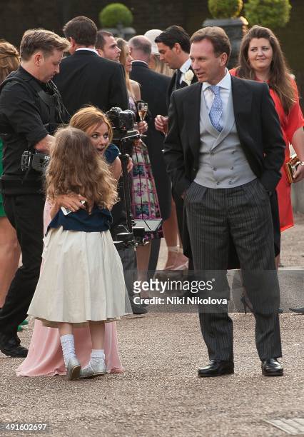 Bluebell Halliwell, Geri Halliwell and Christian Horner attend Poppy Delevingne and James Cook's wedding reception held in Kensington Palace Gardens...