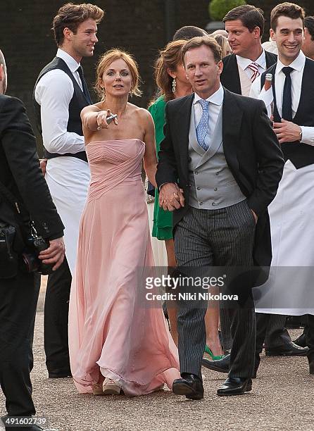 Geri Halliwell and Christian Horner attend Poppy Delevingne and James Cook's wedding reception held in Kensington Palace Gardens on May 16, 2014 in...