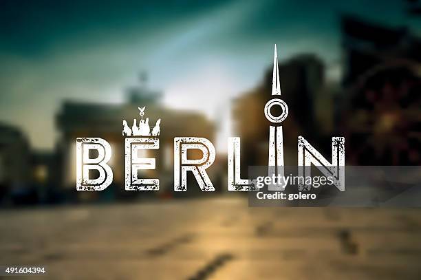 berlin text sign on blurred city background - city gate stock illustrations