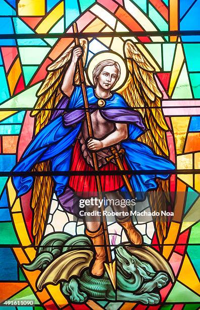 Catholic image in stained glass. The Archangel Gabriel is depicted in colorful stained glass at the Annunciation Catholic Church in Toronto.