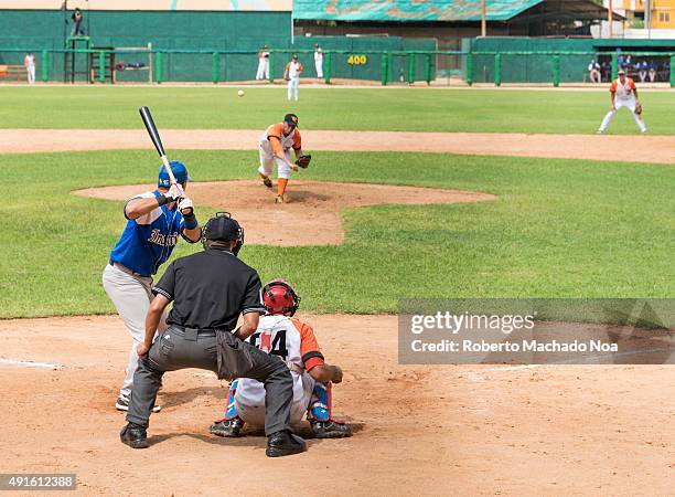 Cuban baseball classic: Industriales vs Villa Clara in the stadium Sandino. Frank Morejon at bat for Industriales.
