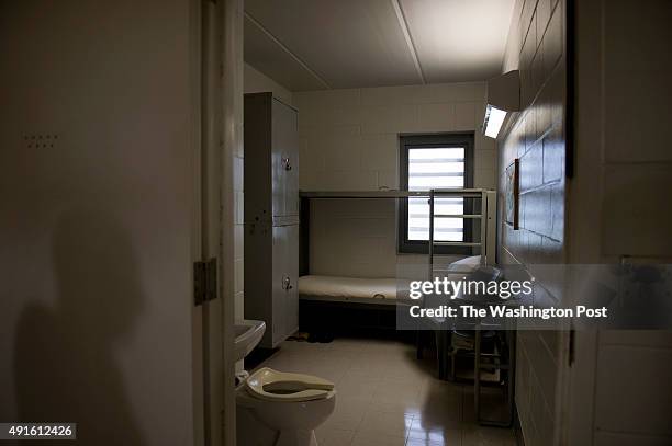 The 8X13 dimensions of a sparse prison cell houses 2 inmates at FCI Coleman Medium - Federal Bureau of Prisons, in Coleman, Florida, on Monday, April...