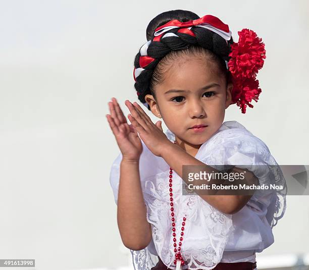 Close up of little girl clapping while performing the Flamenco folk dance at MexFest 2015 in Toronto. MexFest 2015 is celebration of all things...