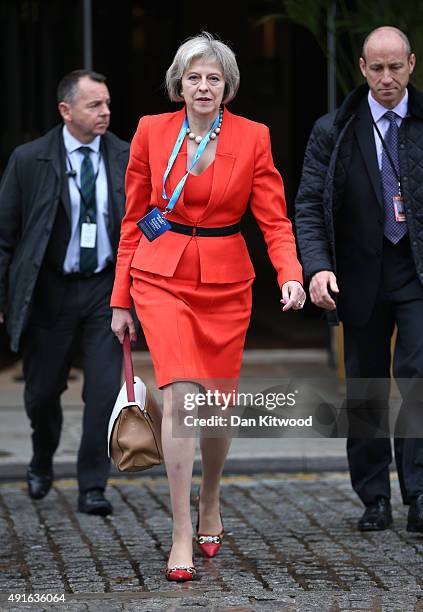 Home Secretary Theresa May arrives for the fourth and final day of the Conservative Party Conference, at Manchester Central on October 7, 2015 in...