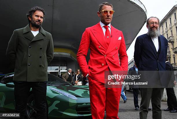 Chef Carlo Cracco, Founder and president of Italia Independent Lapo Elkann and architect Michele De Lucchi pose during the presentation of Garage...