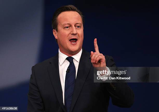 British Prime Minister David Cameron gives his keynote speech to delegates on the fourth and final day of the Conservative Party Conference, at...