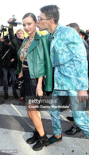 Ukrainian journalist/prankster Vitalii Sediuk targets model Miranda Kerr as she arrives to attend the Louis Vuitton show as part of the Paris Fashion...