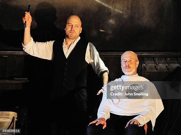 David Arnsperger as Sweeney Todd, Steven Page as Judge Turpin, perform on stage in the Welsh National Opera's "Sweeney Todd" at Wales Millenium...