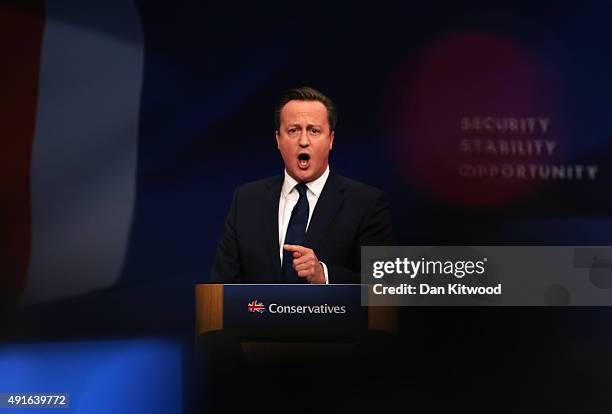 British Prime Minister David Cameron gives his keynote speech to delegates on the fourth and final day of the Conservative Party Conference, at...