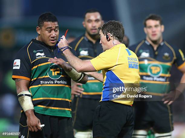 Salesi Ma'afu of Northampton is shown the red card by referee JP Doyle after fighting with Leicester hooker Tom Youngs during the Aviva Premiership...