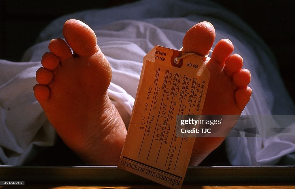 A dead female body with a toe tag