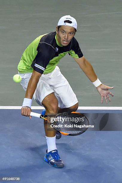 Tatsuma Ito of Japan competes against Stan Wawrinka of Switzerland during the men's singles second round match on day three of Rakuten Open 2015 at...