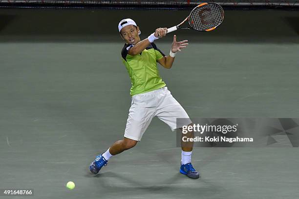 Tatsuma Ito of Japan competes against Stan Wawrinka of Switzerland during the men's singles second round match on day three of Rakuten Open 2015 at...