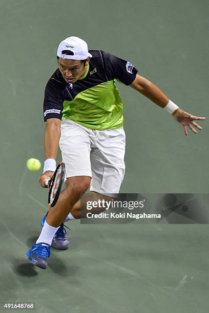 Tatsuma Ito of Japan competes against Stan Wawrinka of Switzerland during the men's singles second round match on day three of Rakuten Open 2015 at...