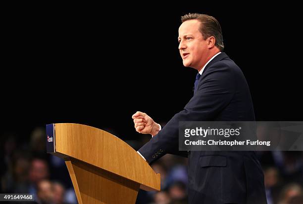British Prime Minister David Cameron gives his keynote speech to delegates on the fourth and final day of the Conservative Party Conference, at...