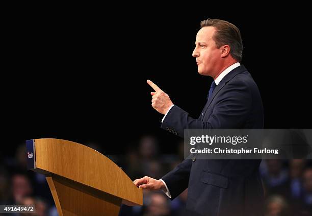 British Prime Minister David Cameron gives his keynote speech to delegates on the fourth and final day of the Conservative Party Conference, at...