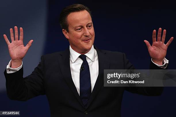 British Prime Minister David Cameron gives his keynote speech to delegates on the fourth and final day of the Conservative Party Conference, at...