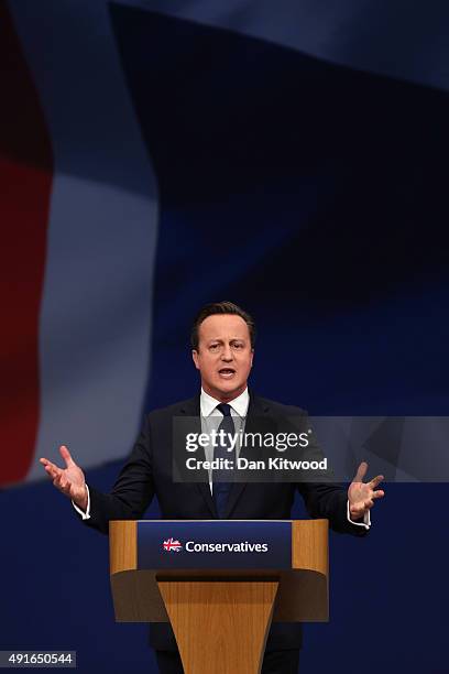 British Prime Minister David Cameron gives his keynote speech to delegates on the fourth and final day of the Conservative Party Conference, at...