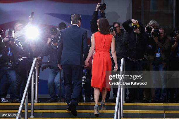 British Prime Minister David Cameron and wife Samantha arrive for the fourth and final day of the Conservative Party Conference, at Manchester...