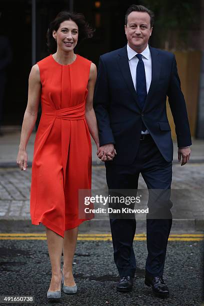 British Prime Minister David Cameron and wife Samantha arrive for the fourth and final day of the Conservative Party Conference, at Manchester...