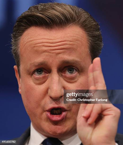 British Prime Minister David Cameron gives his keynote speech to delegates on the fourth and final day of the Conservative Party Conference, at...