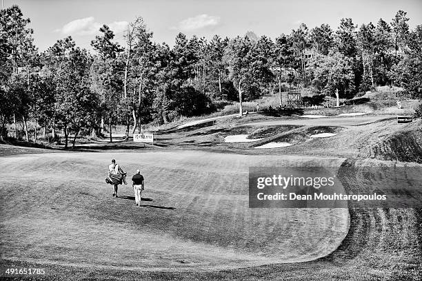 Graeme Storm of England and his caddie walk on the 9th hole during Day 2 of the Open de Espana held at PGA Catalunya Resort on May 16, 2014 in...