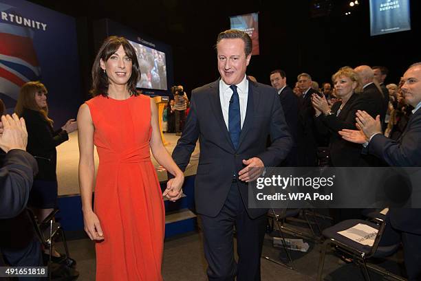 Prime Minister David Cameron leaves the stage with wife Samantha after his keynote speech on the fourth and final day of the Conservative Party...