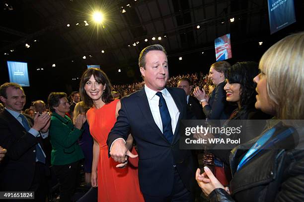 Prime Minister David Cameron leaves the stage with wife Samantha after his keynote speech on the fourth and final day of the Conservative Party...