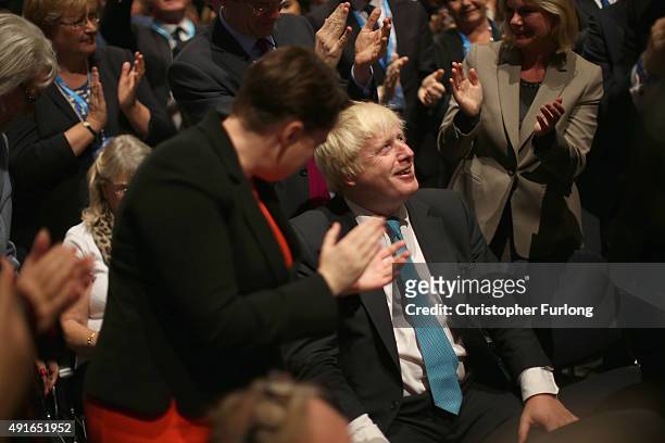 Mayor of London Boris Johnson is appluaded by the audience after Prime Minister David Cameron thanked him in his keynote speech to delegates on the...