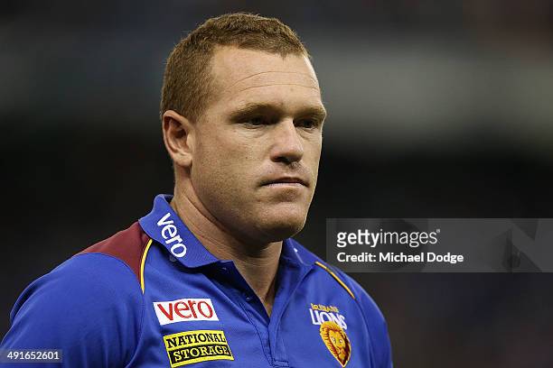 Lions coach Justin Leppitsch looks ahead during the round nine AFL match between the North Melbourne Kangaroos and the Brisbane Lions at Etihad...