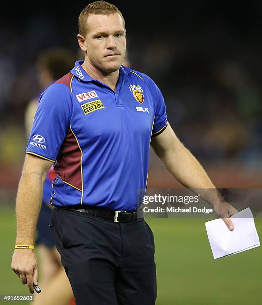 Lions coach Justin Leppitsch looks ahead during the round nine AFL match between the North Melbourne Kangaroos and the Brisbane Lions at Etihad...