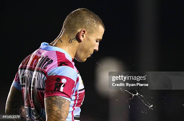 Todd Carney of the Sharks looks on during the round 10 NRL match between the Cronulla-Sutherland Sharks and the Wests Tigers at Remondis Stadium on...