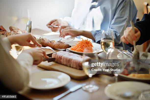 friends sharing a meal in the cafe in the early af - comida francesa fotografías e imágenes de stock