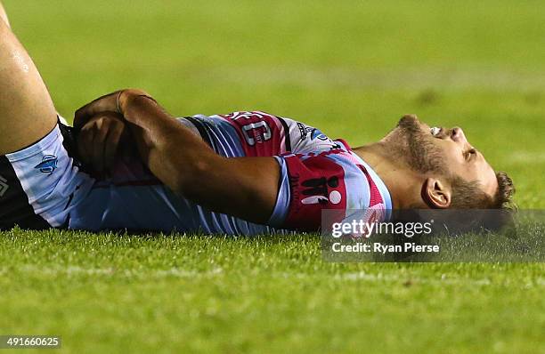 Beau Ryan of the Sharks injures his arm during the round 10 NRL match between the Cronulla-Sutherland Sharks and the Wests Tigers at Remondis Stadium...