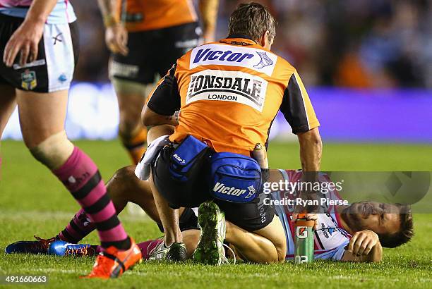 Beau Ryan of the Sharks injures his arm during the round 10 NRL match between the Cronulla-Sutherland Sharks and the Wests Tigers at Remondis Stadium...