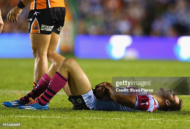 Beau Ryan of the Sharks injures his arm during the round 10 NRL match between the Cronulla-Sutherland Sharks and the Wests Tigers at Remondis Stadium...