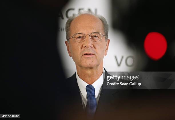 Hans Dieter Poetsch, seen between the equipment of a TV cameraman, speaks to the media after Volkswagen board members elected Poetsch as new chairman...