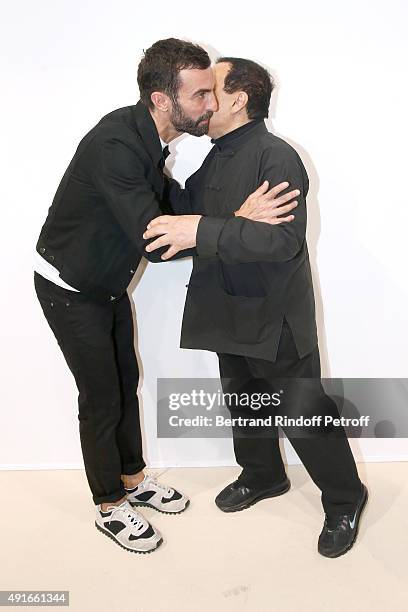 Fashion Designers Nicolas Ghesquiere and Azzedine Alaia pose Backstage after the Louis Vuitton show as part of the Paris Fashion Week Womenswear...