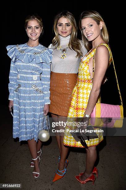 Lala Rudge, guest and Helena Bordon attend the Miu Miu show as part of the Paris Fashion Week Womenswear Spring/Summer 2016 on October 7, 2015 in...