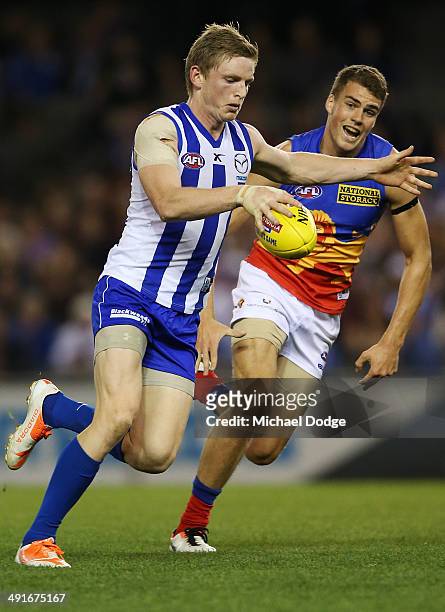 Jack Ziebell of the Kangaroos kicks a goal during the round nine AFL match between the North Melbourne Kangaroos and the Brisbane Lions at Etihad...