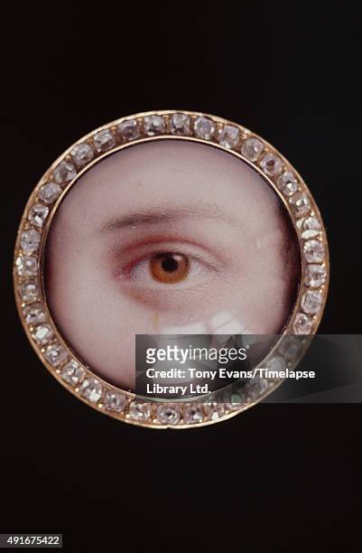 Fabergé ornament in the shape of a human eye surrounded by jewels, circa 1980.