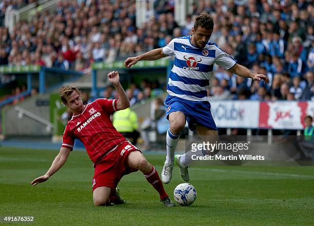 Tomas Kalas of Middlesbrough slides in to tackle Orlando Sa of Reading during the Sky Bet Championship match between Reading and Middlesbrough at...