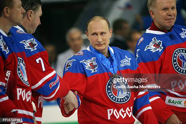 Russian President Vladimir Putin attends a Night Hockey League ice hockey match on October 7, 2015 in Sochi, Russia. Putin spent his 63rd birthday...