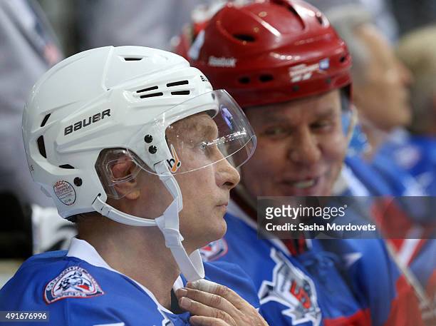 Russian President Vladimir Putin attends a Night Hockey League ice hockey match with former NHL player Vyacheslav Fetsiov on October 7, 2015 in...