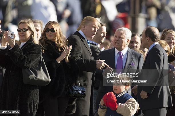 Playoffs: View of businessman and celebrity media personality Donald Trump with wife Melania Trump and New England Patriots owner Robert Kraft before...